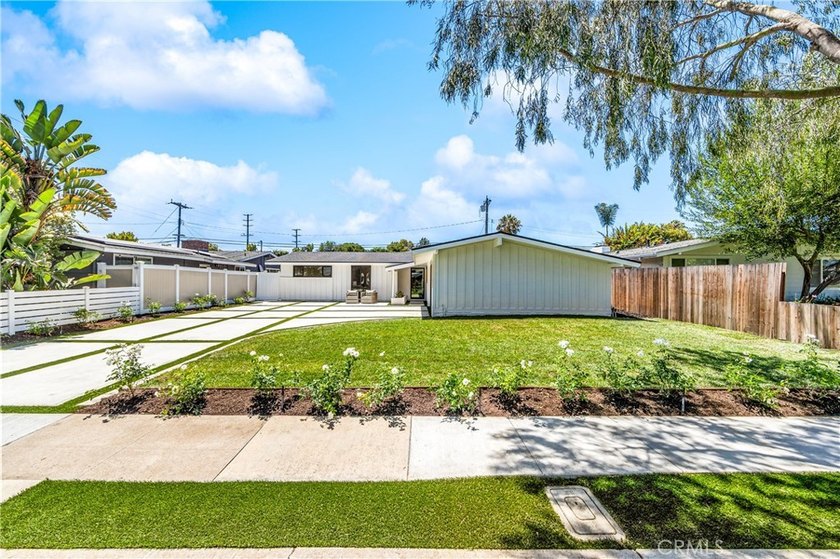 Located in the highly desired community of College Park, this - photo 2