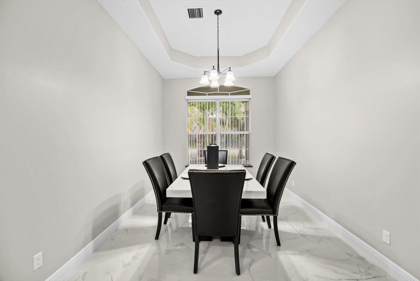 Welcome to this thoughtfully designed single-story residence in - photo 7
