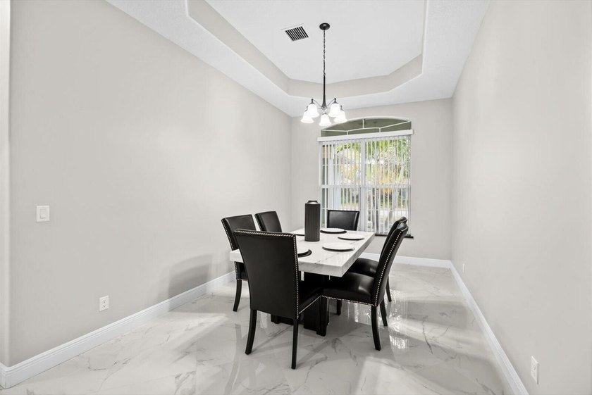 Welcome to this thoughtfully designed single-story residence in - photo 8