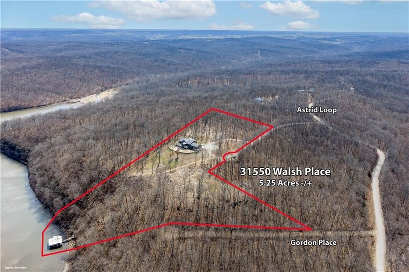 Indulge in waterfront living on approximately 5 serene acres at - photo 11