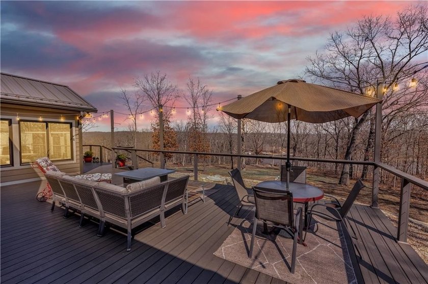 Indulge in waterfront living on approximately 5 serene acres at - photo 13