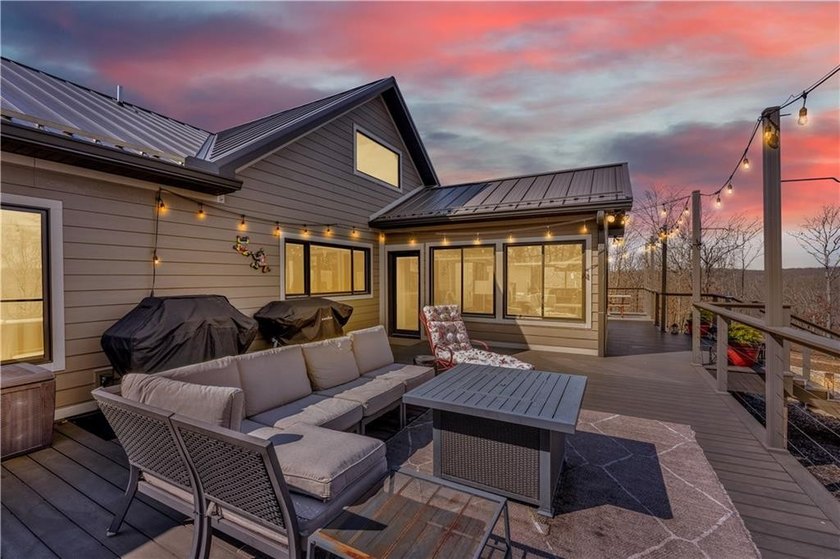 Indulge in waterfront living on approximately 5 serene acres at - photo 14