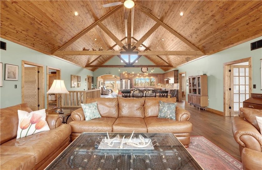 Indulge in waterfront living on approximately 5 serene acres at - photo 17