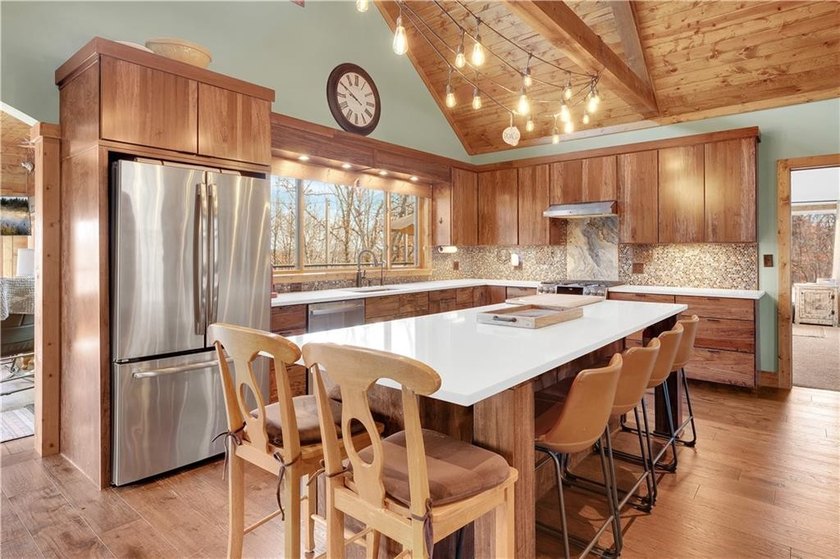Indulge in waterfront living on approximately 5 serene acres at - photo 23