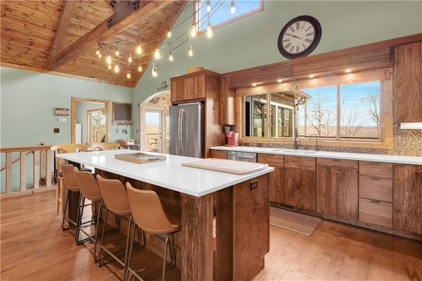 Indulge in waterfront living on approximately 5 serene acres at - photo 25