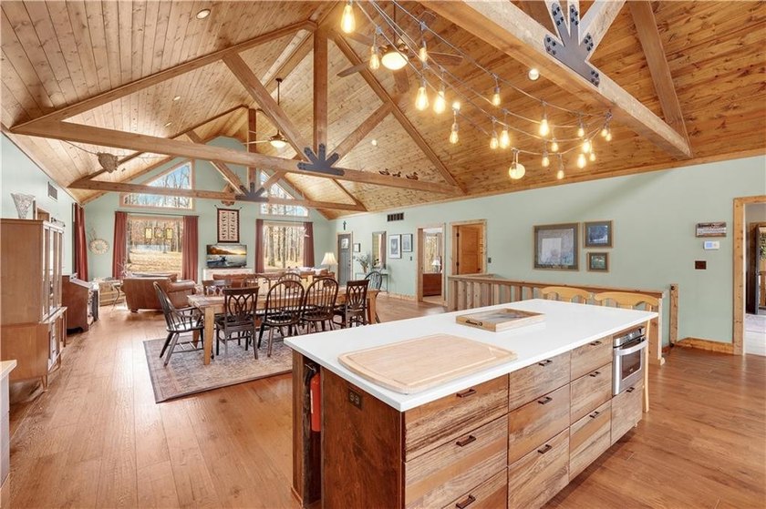 Indulge in waterfront living on approximately 5 serene acres at - photo 26