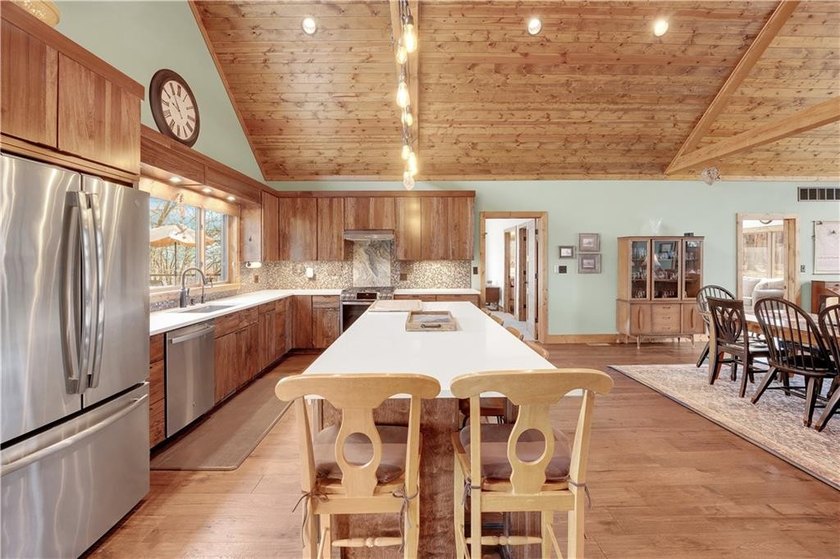 Indulge in waterfront living on approximately 5 serene acres at - photo 30