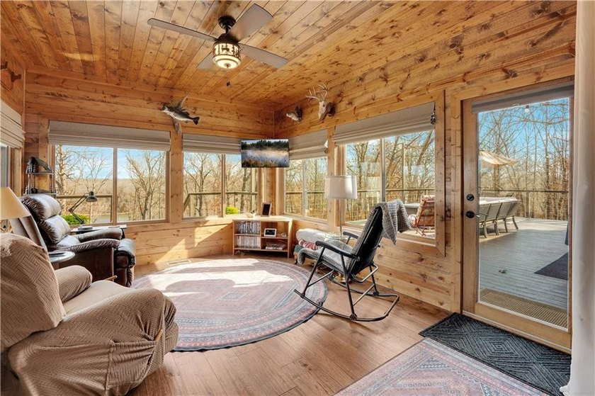 Indulge in waterfront living on approximately 5 serene acres at - photo 33