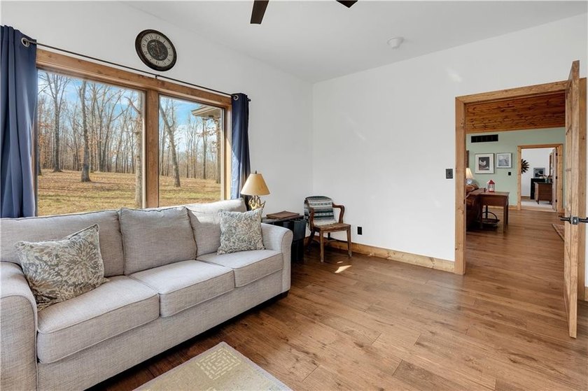 Indulge in waterfront living on approximately 5 serene acres at - photo 46