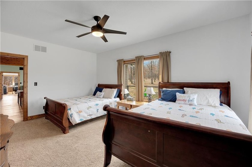 Indulge in waterfront living on approximately 5 serene acres at - photo 49