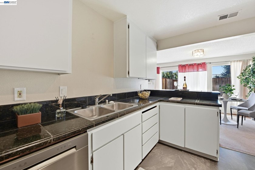 Step into a home that effortlessly blends comfort, charm, and - photo 12