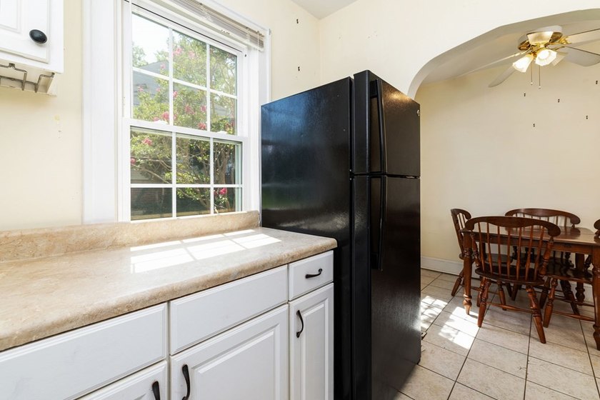 Charming 2-bedroom, 1-bath brick home situated on a corner lot - photo 8