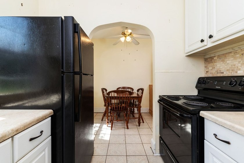 Charming 2-bedroom, 1-bath brick home situated on a corner lot - photo 9