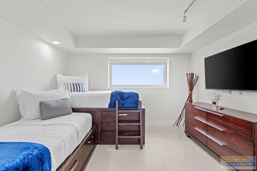 Exquisite design meets coastal elegance in this beautifully - photo 15