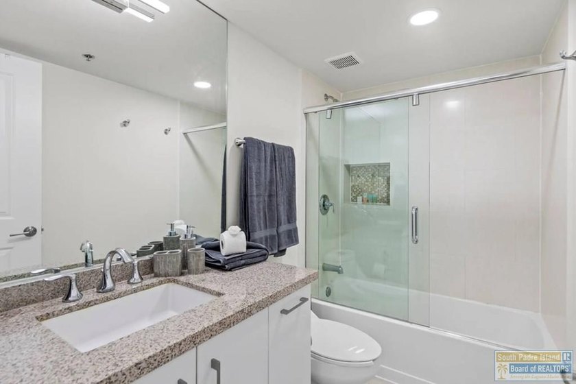 Exquisite design meets coastal elegance in this beautifully - photo 17