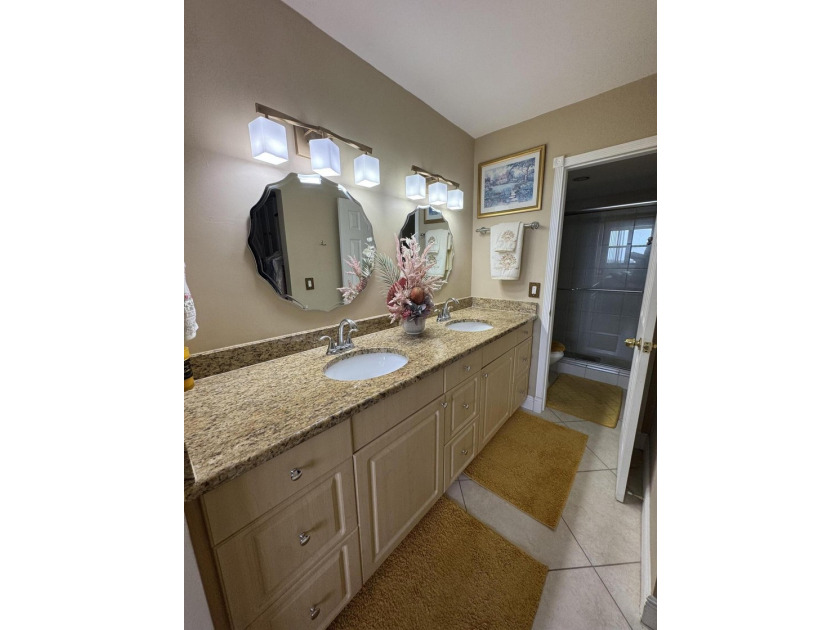 Welcome to this well-appointed 2/2 unit located in the Gemini in - photo 18