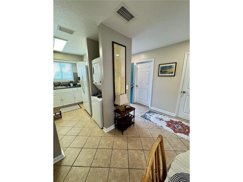 This is a two bedroom two bath condo has a large back porch - photo 5