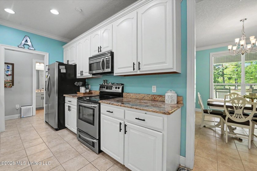 PRICE REDUCED! Situated on 7 acres with a pond and a 30' - photo 16