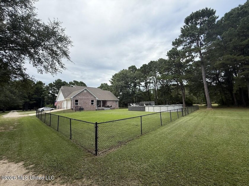 PRICE REDUCED! Situated on 7 acres with a pond and a 30' - photo 39