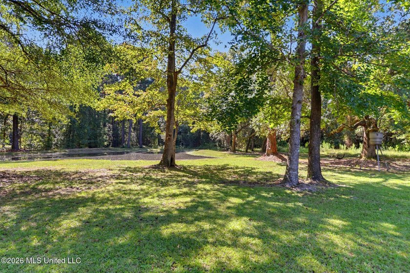 PRICE REDUCED! Situated on 7 acres with a pond and a 30' - photo 47