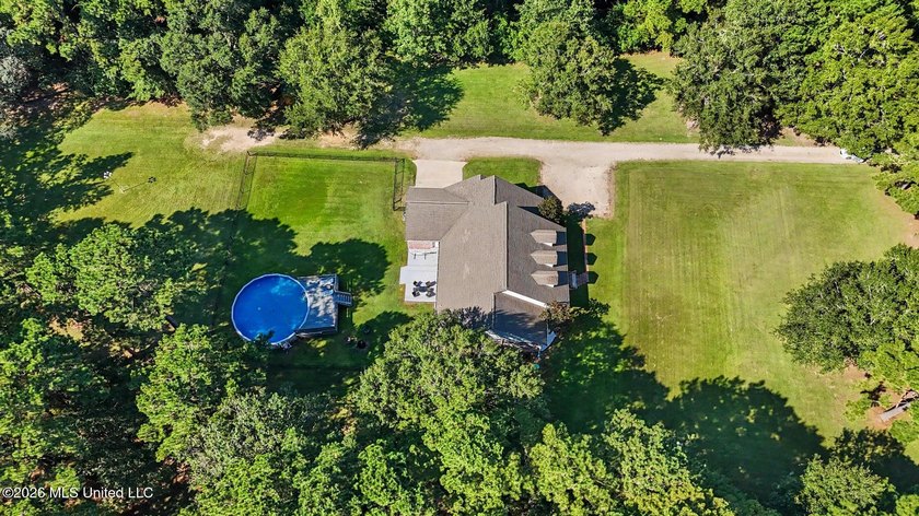 PRICE REDUCED! Situated on 7 acres with a pond and a 30' - photo 50