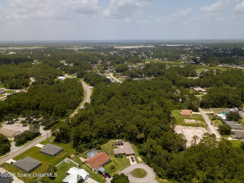 This 6.5 acres currently zoned neighborhood commercial could be - photo 2