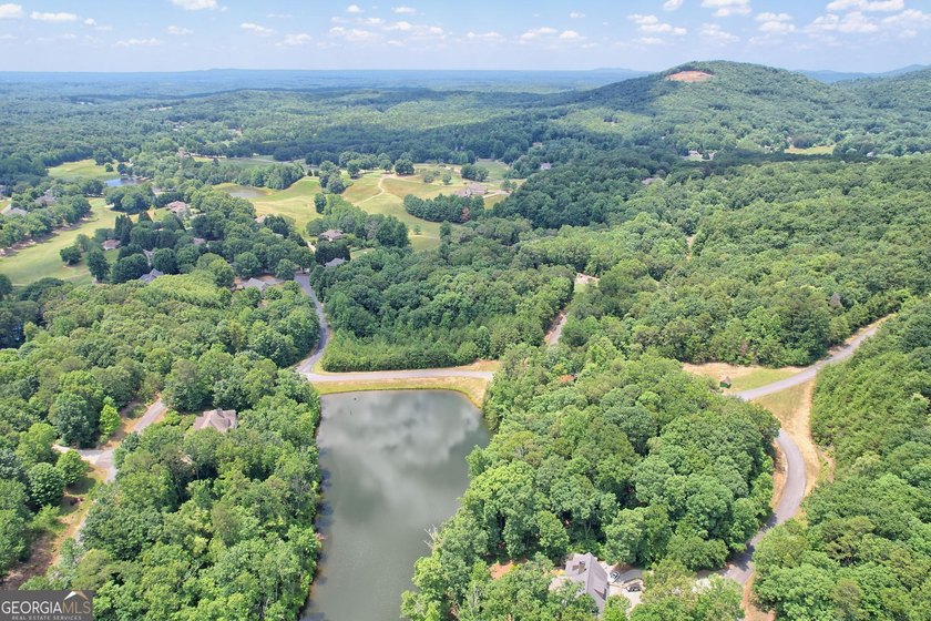 gated Orchard Golf &amp; Country Club. Situated along the shores of - photo 11