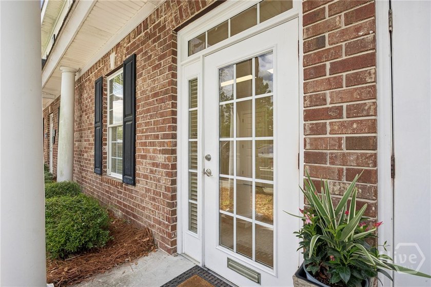 Welcome to this beautifully updated, ground-floor condo offering - photo 4