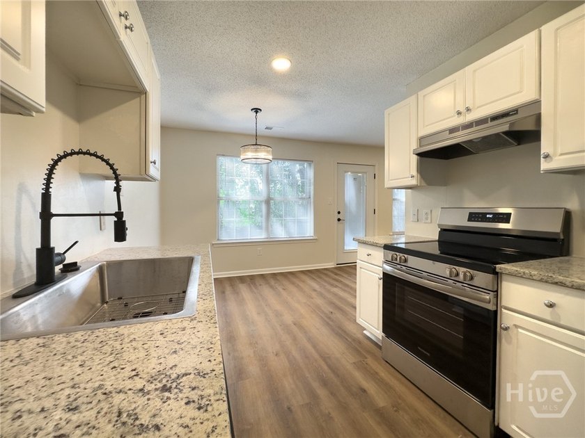 Experience modern comfort and Savannah charm in this beautifully - photo 8