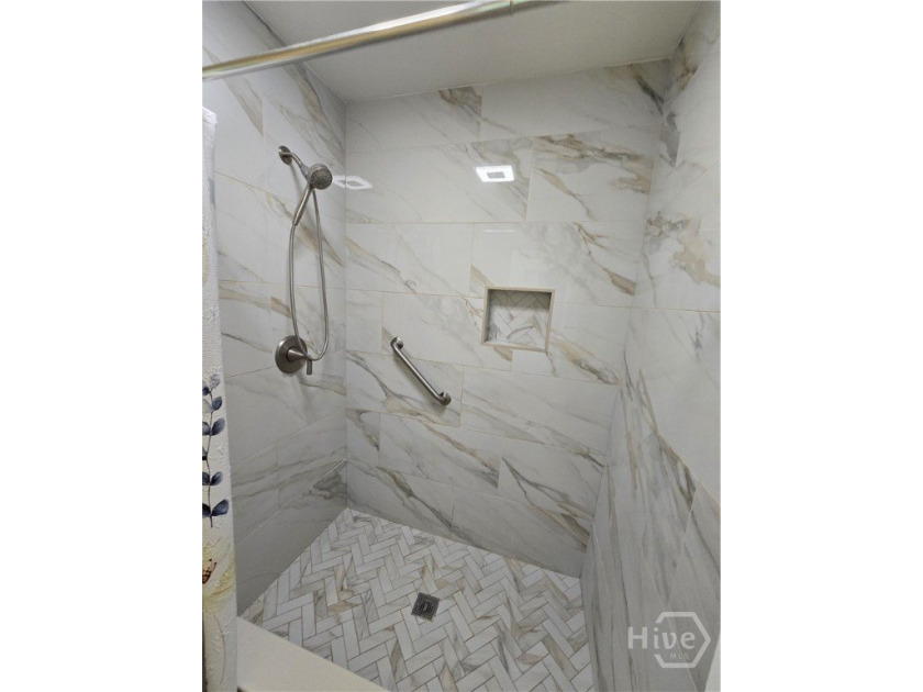 Built by Ernest Homes in 2009 this home still has many of its - photo 8