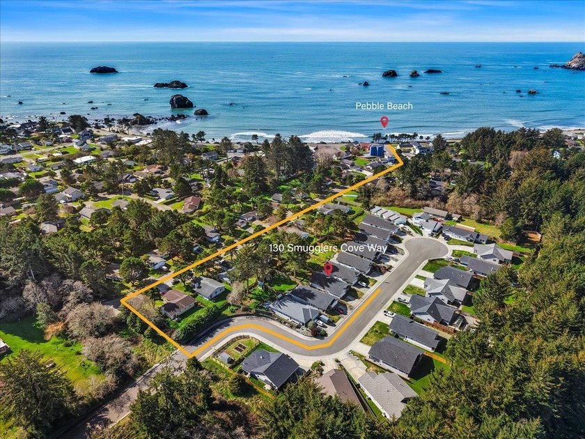 Live just steps from the ocean in the thoughtfully built - photo 8