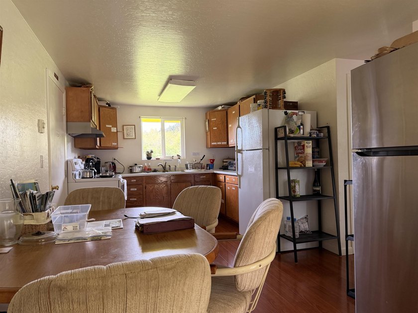 Tucked at the very end of a quiet drive, this three-bedroom - photo 4