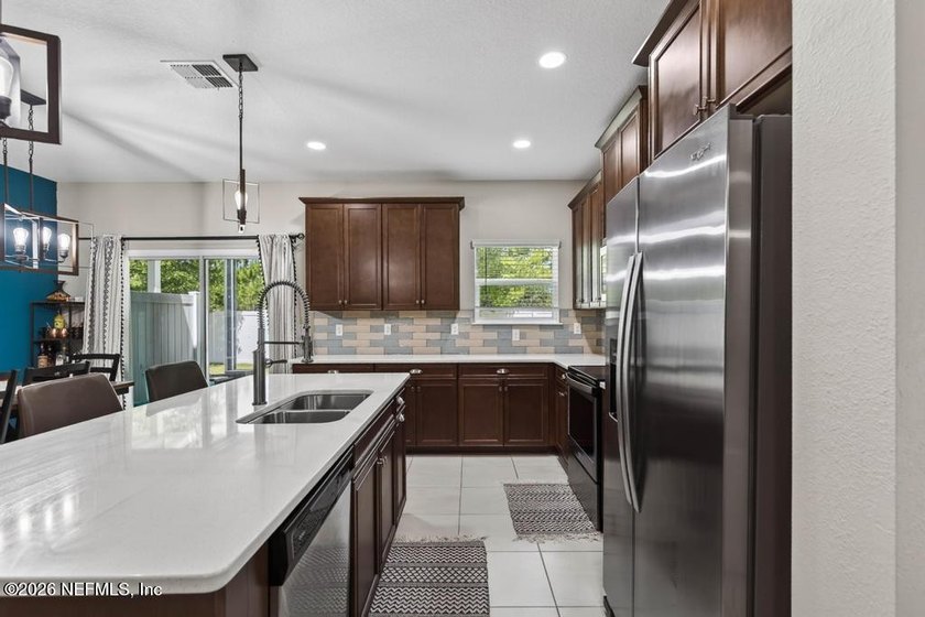 Welcome home to low-maintenance living in the desirable Wells - photo 11