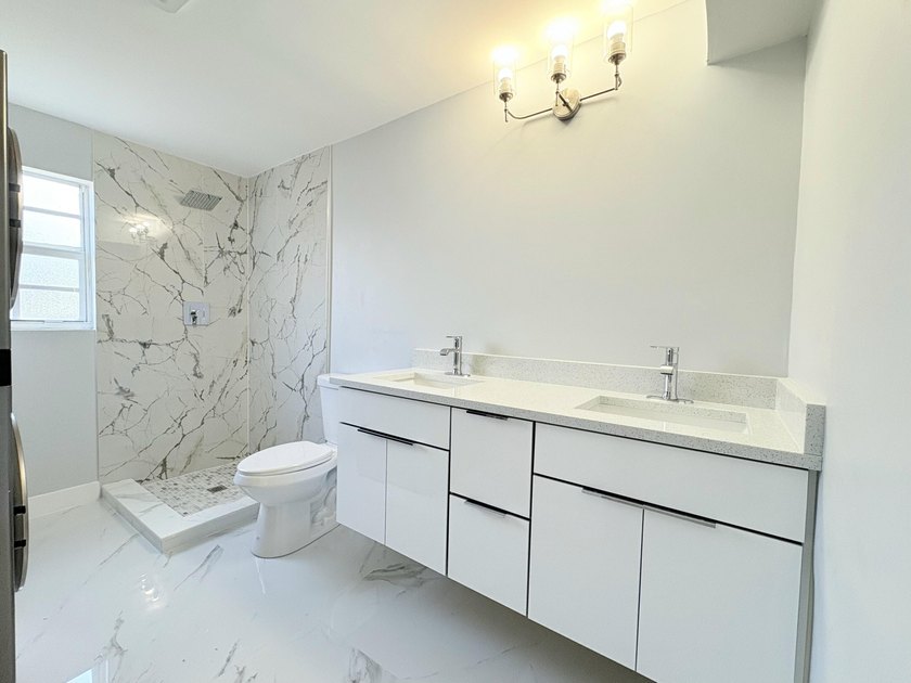 Completely remodeled inside and out-move-in ready! This - photo 13