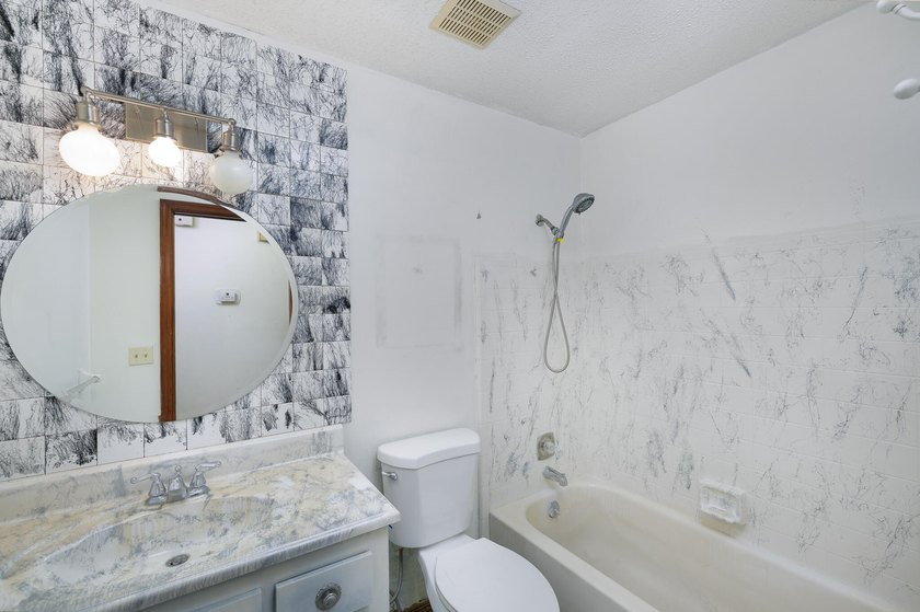 Beautiful three-bedroom, two bath home located in a charming - photo 20
