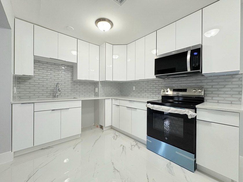 Completely remodeled inside and out-move-in ready! This - photo 30