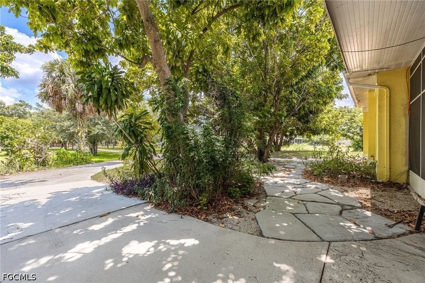 Nestled on over 2.5 private acres in Fort Myers, this spacious - photo 32