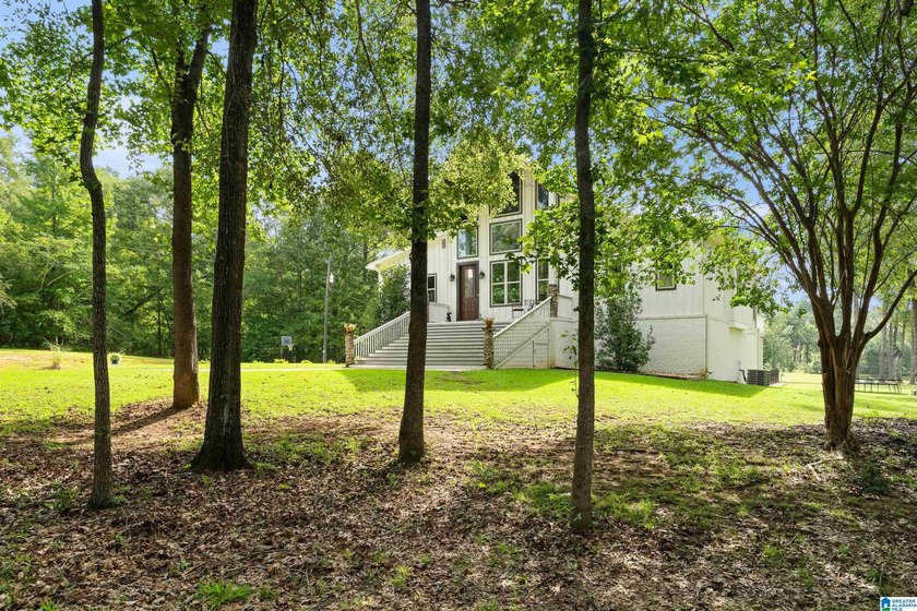 Beautiful 3-bedroom, 3 1/2 bath lakefront home that truly has it - photo 5