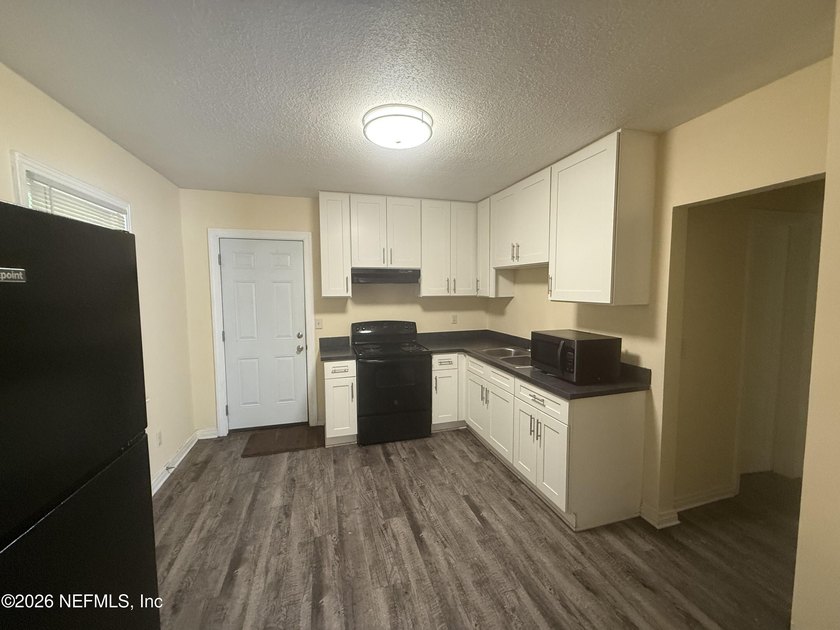 This 2-bedroom, 1-bathroom home is an excellent opportunity for - photo 12