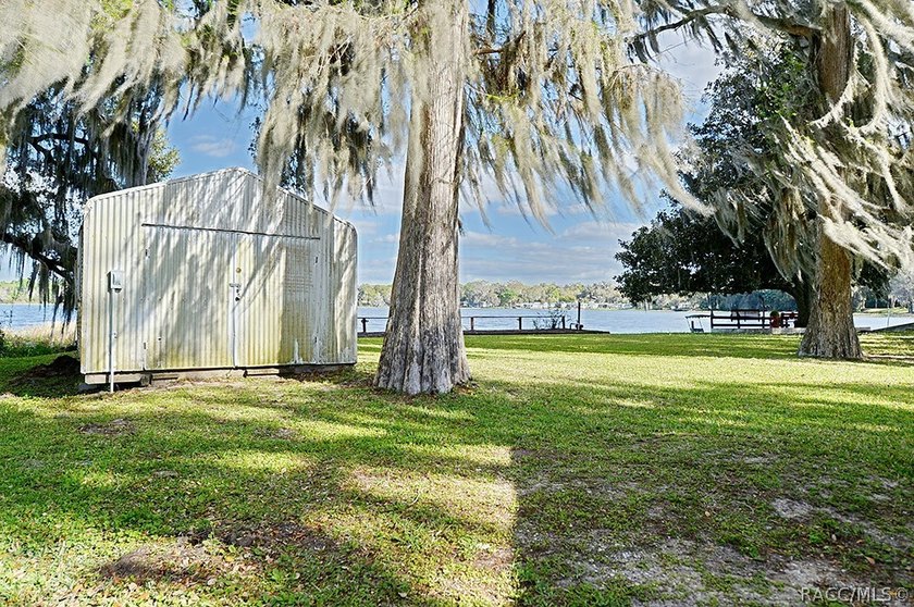 This charming waterfront property offers a serene water views - photo 25