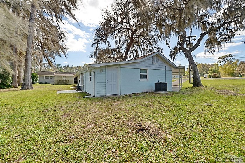 This charming waterfront property offers a serene water views - photo 26