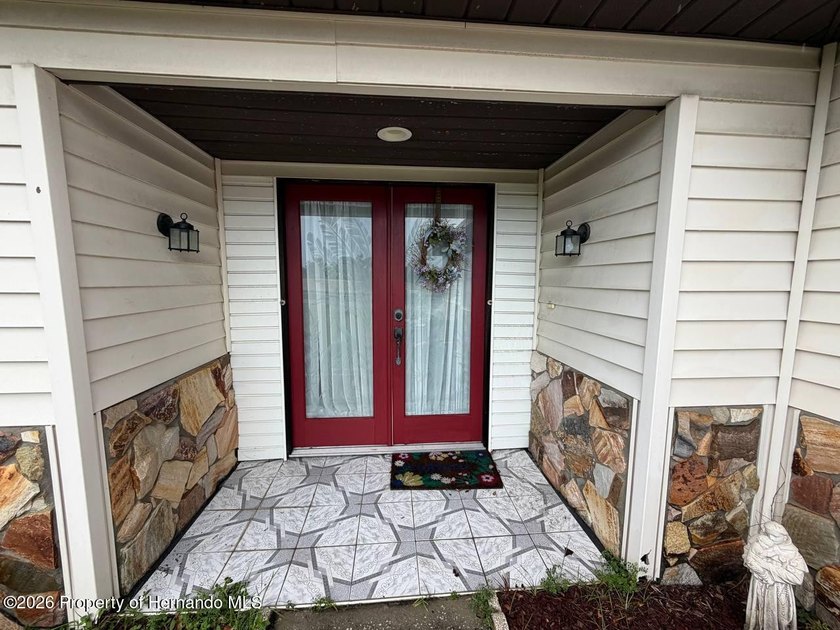 Welcome to this spacious 3-bedroom, 2-bath home featuring a - photo 2
