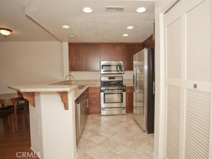 Welcome to this updated two-bedroom, two-bath condominium - photo 2
