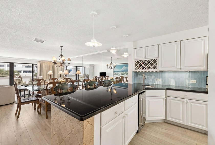Experience exceptional beachfront living from this beautifully - photo 14