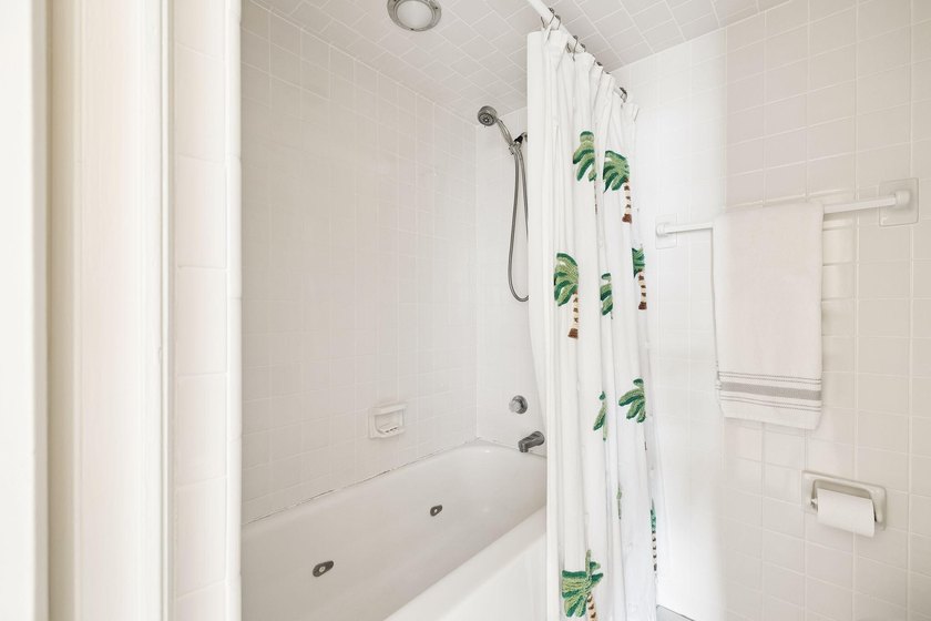 Experience exceptional beachfront living from this beautifully - photo 22