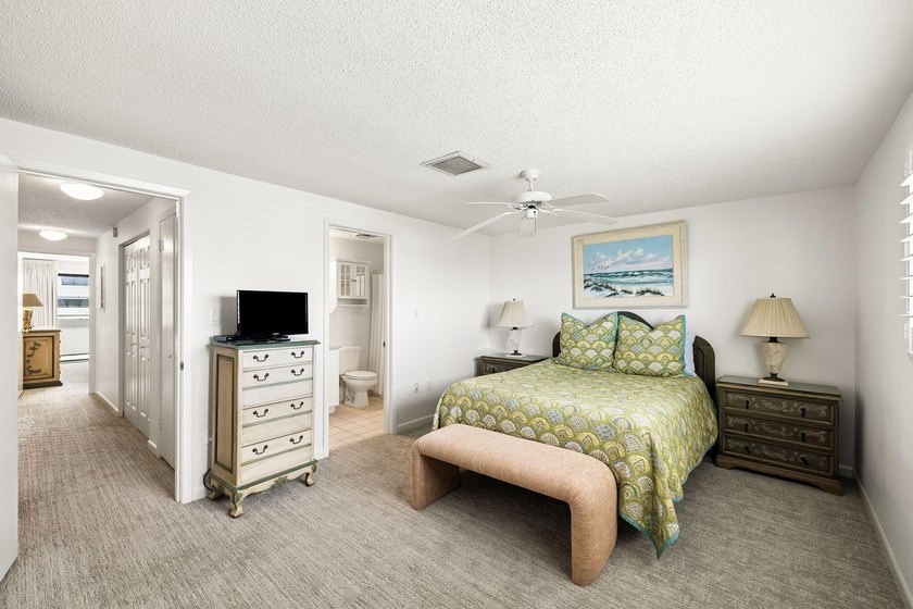 Experience exceptional beachfront living from this beautifully - photo 26
