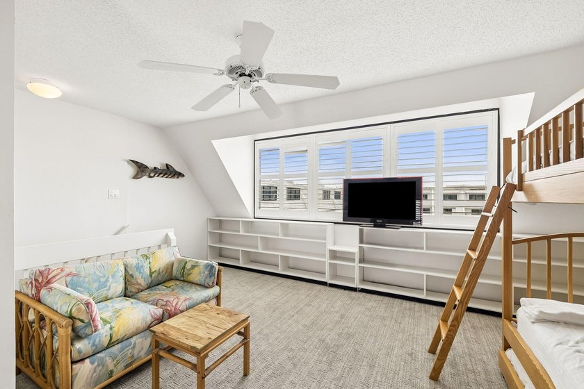 Experience exceptional beachfront living from this beautifully - photo 31