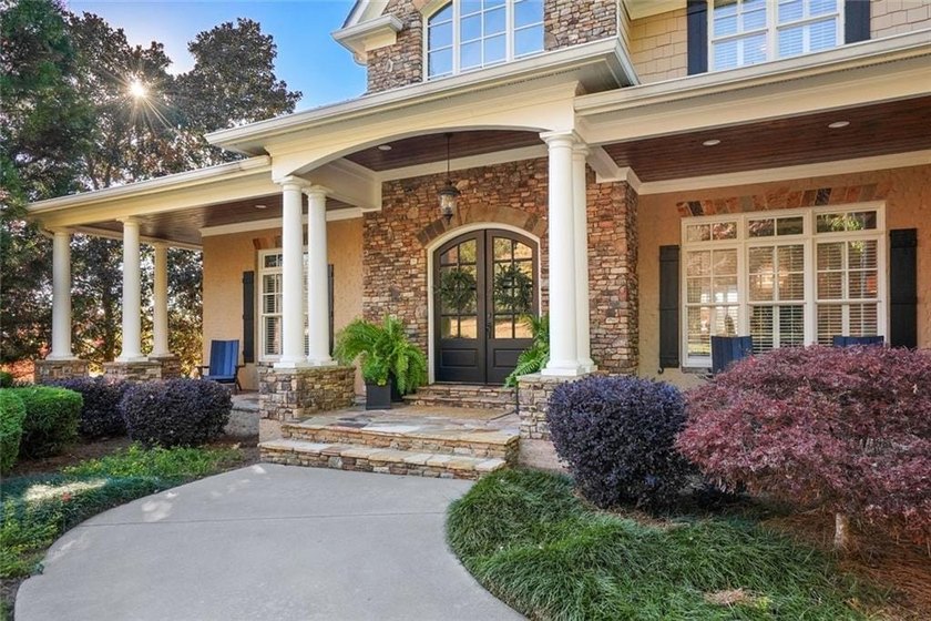 A private North Georgia resort home in The Orchard, where luxury - photo 5