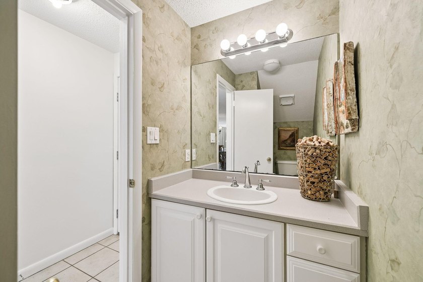 Experience exceptional beachfront living from this beautifully - photo 36