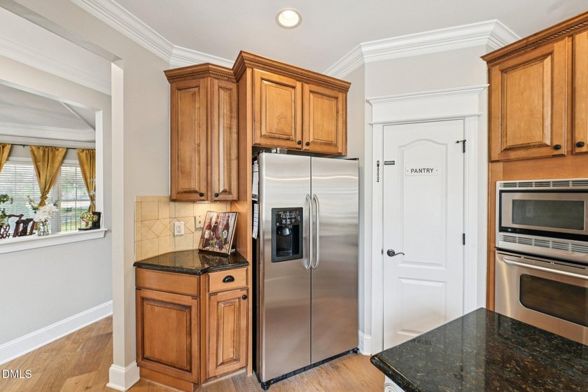 Welcome to this spacious 6-bedroom, 4.5-bath home in The - photo 12